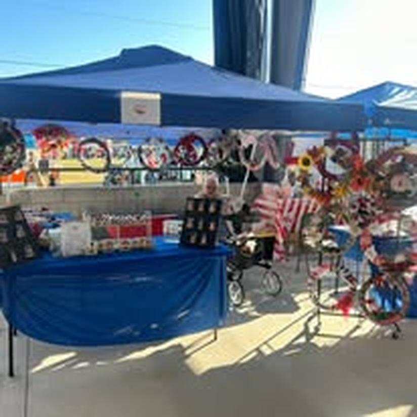 A patriotic-themed craft booth at a community market.